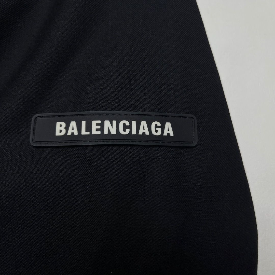 Balenciaga Black Wool Blazer with Sleeve Patch (Category: Coats, Jackets and Outerwear) located in Caloocan City. Submitted by achilles_grails (Listing ID 1471078391, Image 3). Description: - Brand: Balenciaga - Color: Black - Material: Premium wool with black jacquard logo lining - Fit: Tailored fit with structured shoulders - Closure: Three-button front with branded hardware - Details: Rubber Balenciaga logo patch on left sleeve and interior po