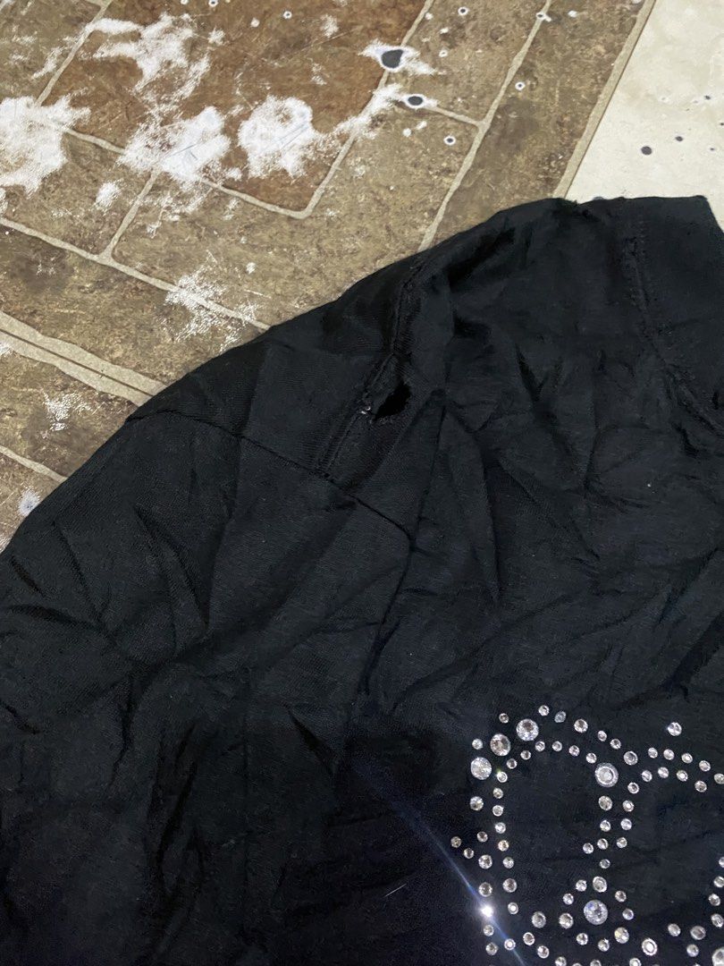 Balenciaga distress Rhinestone crown (Category: Tshirts & Polo Shirts ) located in Tagoloan. Submitted by puretiger-389e (Listing ID 1471048691, Image 3). Description: Balen. Distress buslotbulot 😅 Excellent condition Size xs on tag best fit Large 22x31 dimensions Issue nasa pic po missing po iba stone And washable po yang white Nanakal papo le.eg Dm..