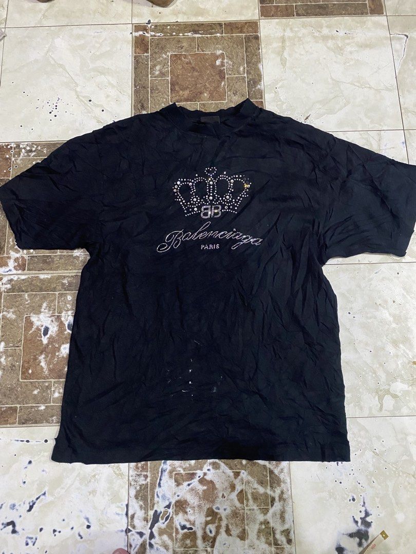Balenciaga distress Rhinestone crown (Category: Tshirts & Polo Shirts ) located in Tagoloan. Submitted by puretiger-389e (Listing ID 1471048691, Image 1). Description: Balen. Distress buslotbulot 😅 Excellent condition Size xs on tag best fit Large 22x31 dimensions Issue nasa pic po missing po iba stone And washable po yang white Nanakal papo le.eg Dm..