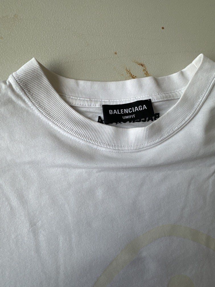 BALENCIAGA SMILEY GLOW IN THE DARK (Category: Tshirts & Polo Shirts ) located in Angeles City. Submitted by royal_vintage_thriftshop (Listing ID 1471016231, Image 3). Description: Authentic Balenciaga Smiley oversized Size. Xs 1 issue picture 6 check Chest 23, Total Length 28 .