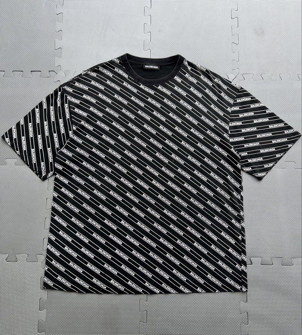 BALENCIAGA TEE AOP (Category: Coats, Jackets and Outerwear) located in Panay. Submitted by kramzy17 (Listing ID 1470989573, Image 1). Description: DIMES WIDTH - 22.5 LENGTH - 28 Color rate - 9/10 ( color may vary due to lightning) Fit to M-L ISSUE - Hairlines .