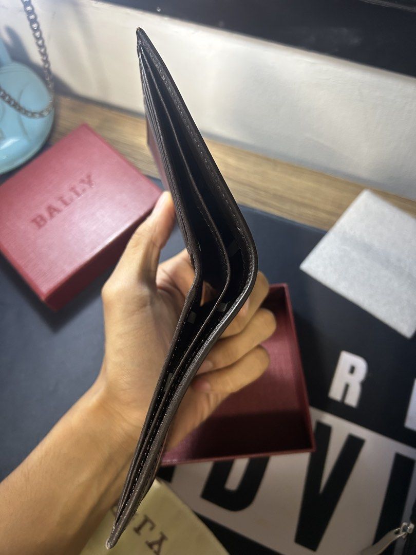Bally Bifold Wallet (Category: Wallets & Card Holders) located in Quezon City. Submitted by marbeezy_amos_xxx (Listing ID 1471045444, Image 3). Description: Unused, no flaws/issues Box and dust bag included PM for more details Price is negotiable.