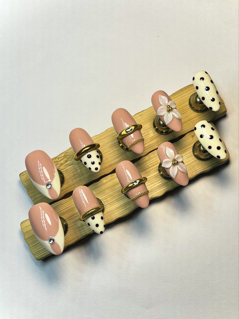 Bangle press on nail set (Category: Hands & Nails) located in Manila. Submitted by nailarchitech.co (Listing ID 1470983389, Image 1). Description: Size: Small Shape: almond Length: Long •includes prep/application kit when purchased • handmade & reusable Message us on IG @nailarchitech.co for further inquiries!.