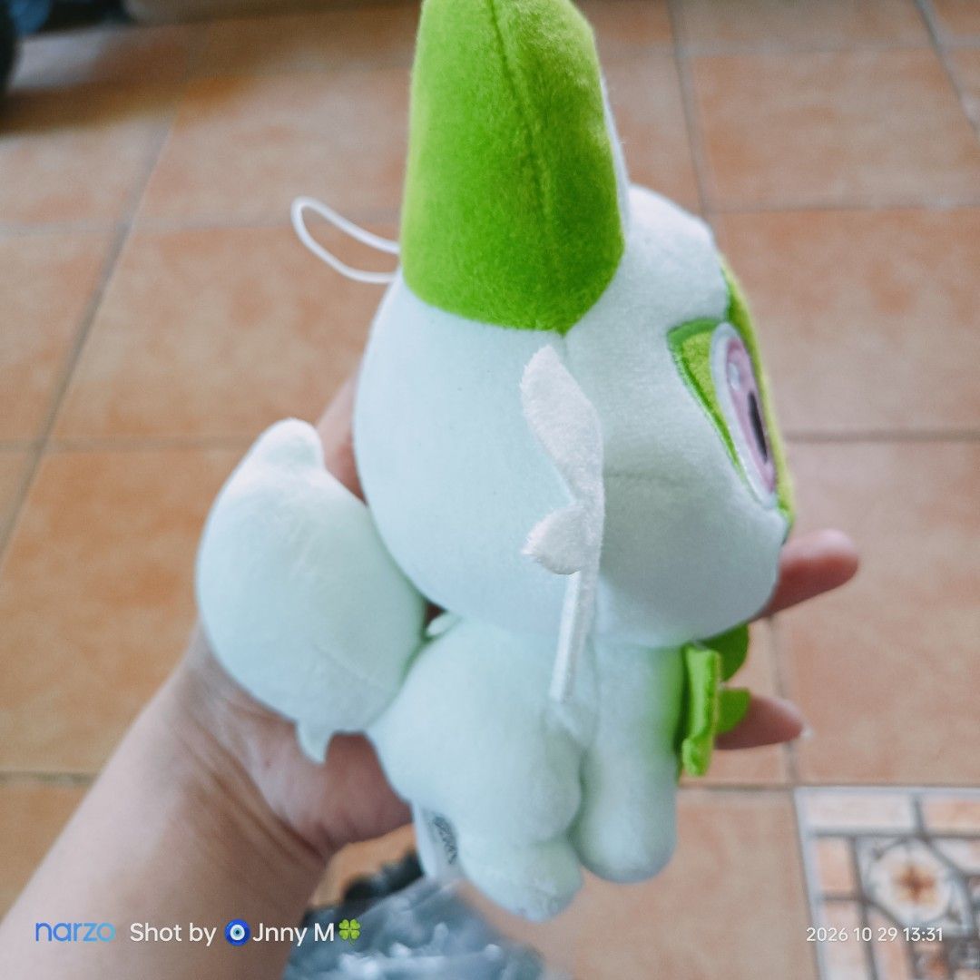 Banpresto Sprigatito Pokémon Plush Toy (Category: Plushies & Soft Toys) located in Taguig. Submitted by mhayestufftoys (Listing ID 1470987741, Image 2). Description: - Authentic Banpresto Pokémon Sprigatito plush toy with official tag attached - Palm-sized and compact, fits easily in your hand - High-quality embroidered facial details and adorable pink paw pads - Includes a convenient hanging loop at the top for easy display - Soft green and whit