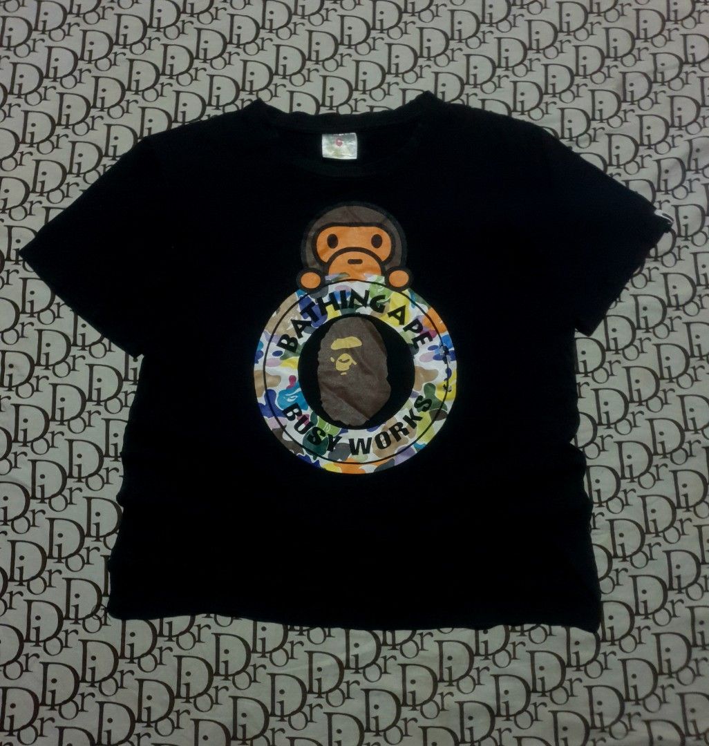 Bape baby Milo (Category: Tshirts & Polo Shirts ) located in San Fernando. Submitted by retro.district. (Listing ID 1471104372, Image 1). Description: - Bape baby Milo - Size: Large(21x27) - Condition: Good - issue: print - Color Rate: 8.5/10.