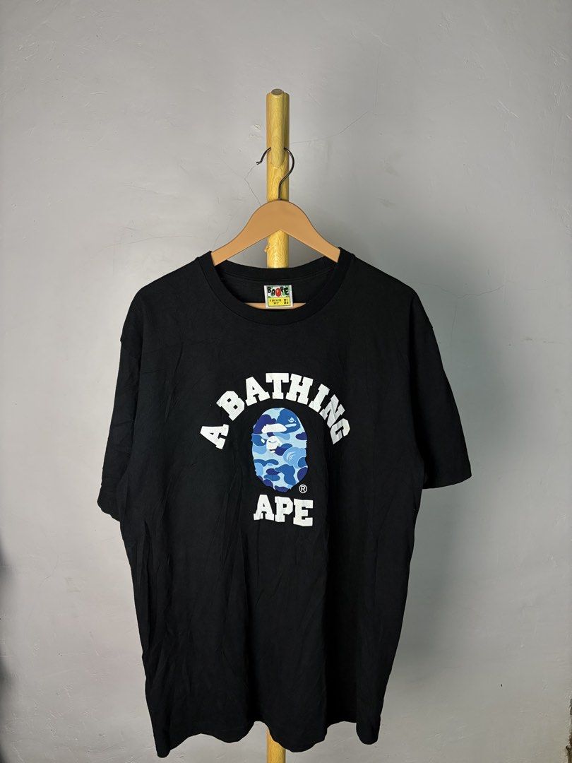 BAPE Blue Camo Arch Logo Tee “ Reflectorized Print “ (Category: Tshirts & Polo Shirts ) located in Bacolod City. Submitted by davidheyzon40257 (Listing ID 1471060231, Image 1). Description: 🥶 WTS – BAPE Blue Camo Arch Logo Tee “ Reflectorized Print “ “ Authentic “ 📏 Size: XL Best fit: Large to XL 📏 Measurements: Width: 21.8 “ Length: 29.5 “ ✨ Condition: 9.5/10 (excellent condition) 🟩 Color Rate: 9.5/10 ⛔️ Flaw: None 📍 Bacolod City 📦 Shippin