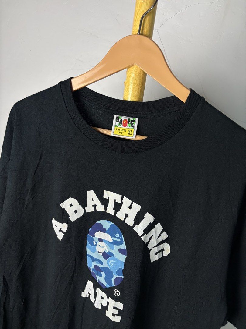 BAPE Blue Camo Arch Logo Tee “ Reflectorized Print “ (Category: Tshirts & Polo Shirts ) located in Bacolod City. Submitted by davidheyzon40257 (Listing ID 1471060231, Image 2). Description: 🥶 WTS – BAPE Blue Camo Arch Logo Tee “ Reflectorized Print “ “ Authentic “ 📏 Size: XL Best fit: Large to XL 📏 Measurements: Width: 21.8 “ Length: 29.5 “ ✨ Condition: 9.5/10 (excellent condition) 🟩 Color Rate: 9.5/10 ⛔️ Flaw: None 📍 Bacolod City 📦 Shippin