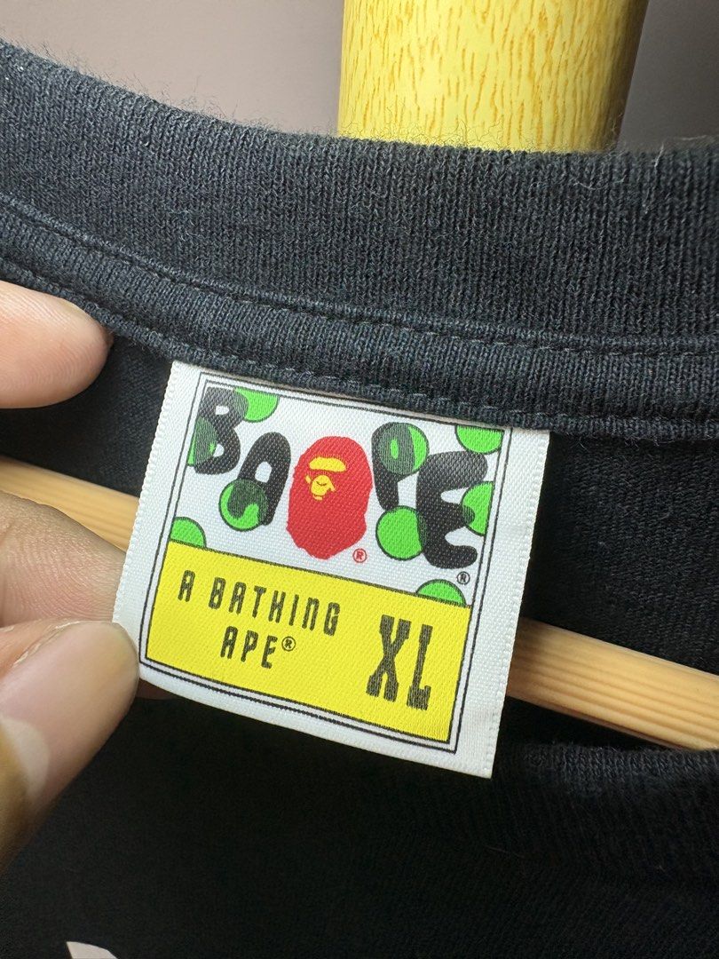 BAPE Blue Camo Arch Logo Tee “ Reflectorized Print “ (Category: Tshirts & Polo Shirts ) located in Bacolod City. Submitted by davidheyzon40257 (Listing ID 1471060231, Image 3). Description: 🥶 WTS – BAPE Blue Camo Arch Logo Tee “ Reflectorized Print “ “ Authentic “ 📏 Size: XL Best fit: Large to XL 📏 Measurements: Width: 21.8 “ Length: 29.5 “ ✨ Condition: 9.5/10 (excellent condition) 🟩 Color Rate: 9.5/10 ⛔️ Flaw: None 📍 Bacolod City 📦 Shippin