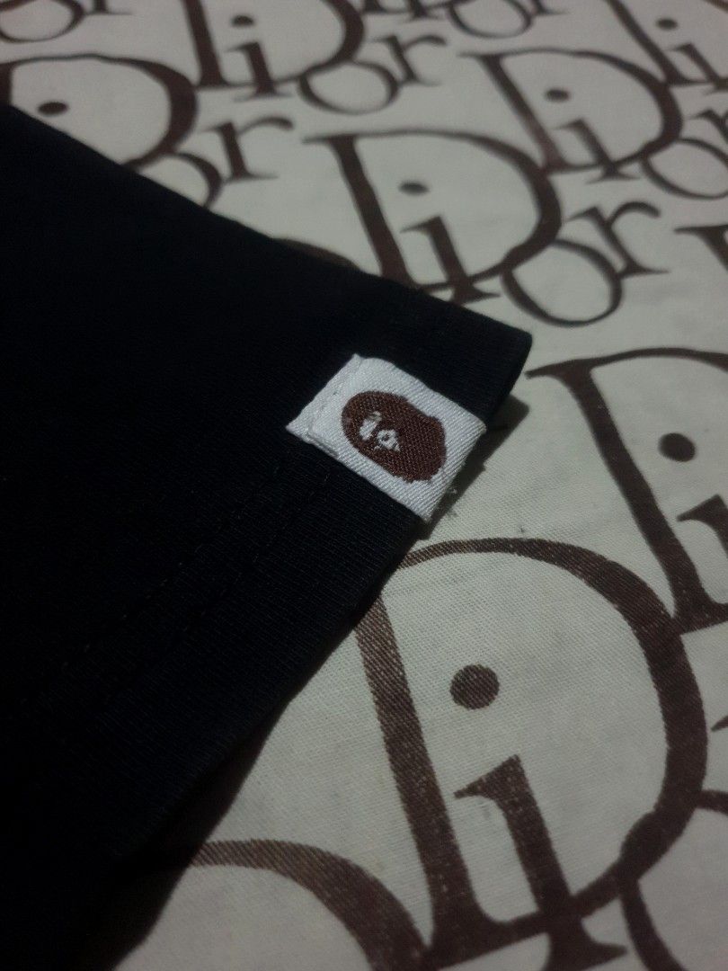 Bape college logo (Category: Tshirts & Polo Shirts ) located in San Fernando. Submitted by retro.district. (Listing ID 1471104646, Image 3). Description: - bape college logo - Size: Medium(20x26) - Condition: Excellent - issue: hairlines - Color Rate: 9.5/10.