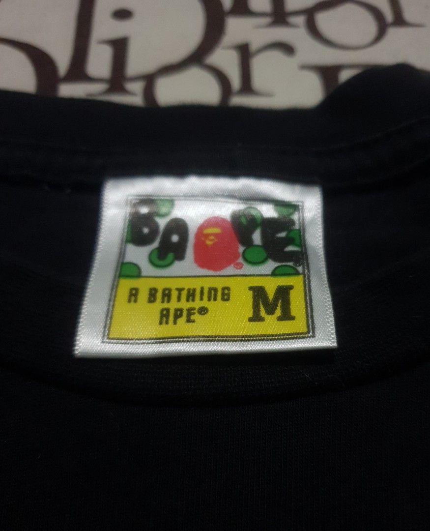Bape college logo (Category: Tshirts & Polo Shirts ) located in San Fernando. Submitted by retro.district. (Listing ID 1471104865, Image 3). Description: - Bape college logo - Size: Large(20x27) - Condition: Excellent - No issue - Color Rate: 9.5/10.