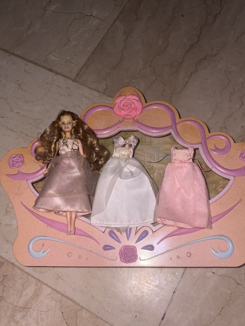 Barbie Doll with Three Dresses and Decorative Stand (Category: Kids Toys) located in Cavite. Submitted by krstnlnnie (Listing ID 1470951833, Image 1). Description: - Mini Barbie in a Nutcracker - Whole Set.