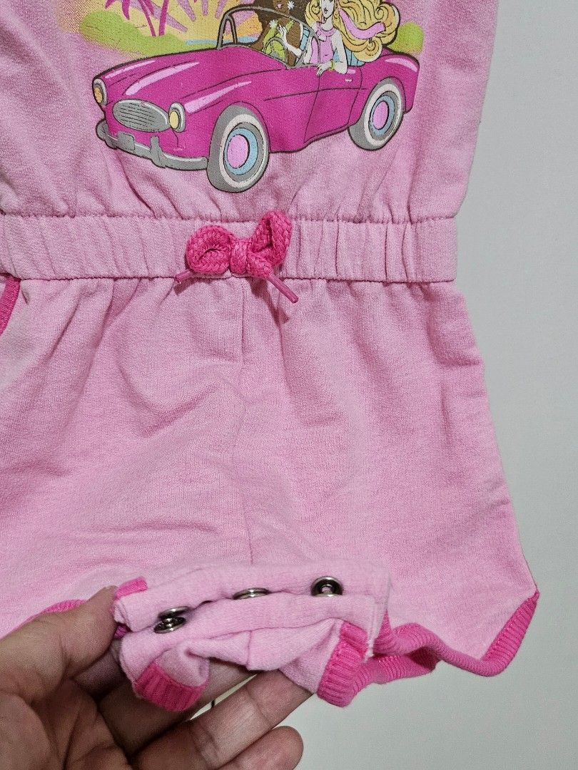 Barbie Pink Romper Size 18M (Category: Babies & Kids Fashion) located in Manila. Submitted by momshiedells (Listing ID 1470955748, Image 3). Description: Barbie Pink Baby Girl Romper – 18M 🎀💗 Cute pink Barbie romper featuring a fun Barbie and convertible graphic, contrast pink trim, and an elastic waist with bow detail. Perfect for casual outings, playdates, and everyday wear! 🚗💕 ✨ Brand/Character: Barbie ✨ Size: 18 months ✨ Color: Pink ✨ Sty