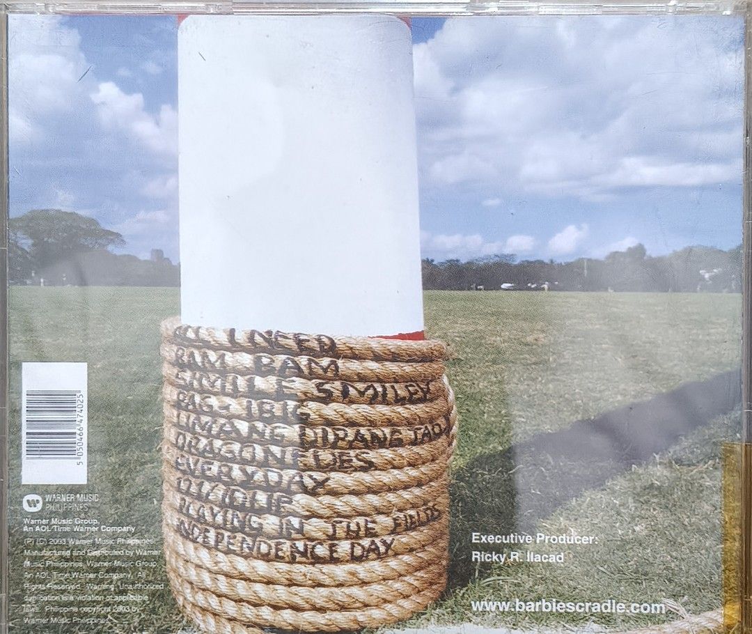 Barbie's Cradle Playing in the Fields CD (Category: CDs & DVDs) located in Manila. Submitted by ruelcabrer77078 (Listing ID 1471098340, Image 3). Description: - Artist & Album: Barbie's Cradle - Playing in the Fields - Release: Warner Music Philippines, 2003 - Inclusions: Original jewel case and CD - Tracklist includes: Ram Bam, Smiley, Pag-ibig, Dragonfly, and more (see back cover photo) - Condition: Disc surface has some markings written on it.