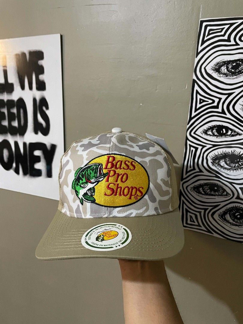 BASSPRO TRUCKER CAP CAMOU KHAKI (Category: Caps & Hats) located in Davao. Submitted by ai_stuffs (Listing ID 1471077556, Image 1). Description: GOOD CONDITION NO ISSUE BNEW.