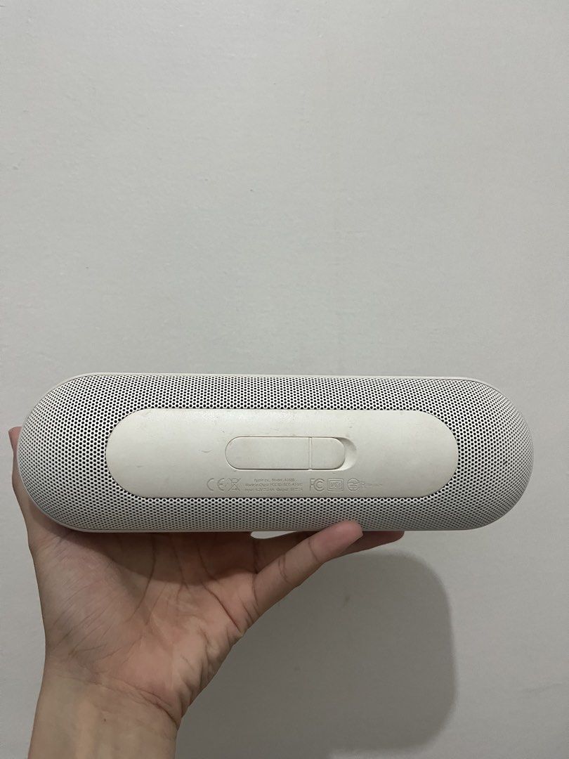 Beats Pill+ Portable Bluetooth Speaker White (Category: Soundbars, Speakers & Amplifiers) located in Cavite. Submitted by sofiamaxyy (Listing ID 1471084507, Image 3). Description: - Item: Beats Pill+ Portable Speaker - Color: White - Condition: Fully functional and ready to pair with phones or tablets - Cosmetic Flaws: Significant wear, scuffs, and visible damage near the power button area - Features: Top volume/power controls, battery indicator 