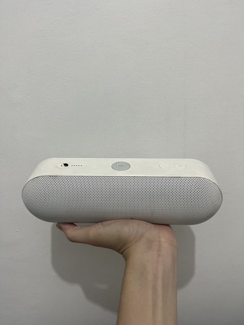 Beats Pill+ Portable Bluetooth Speaker White (Category: Soundbars, Speakers & Amplifiers) located in Cavite. Submitted by sofiamaxyy (Listing ID 1471084507, Image 1). Description: - Item: Beats Pill+ Portable Speaker - Color: White - Condition: Fully functional and ready to pair with phones or tablets - Cosmetic Flaws: Significant wear, scuffs, and visible damage near the power button area - Features: Top volume/power controls, battery indicator 