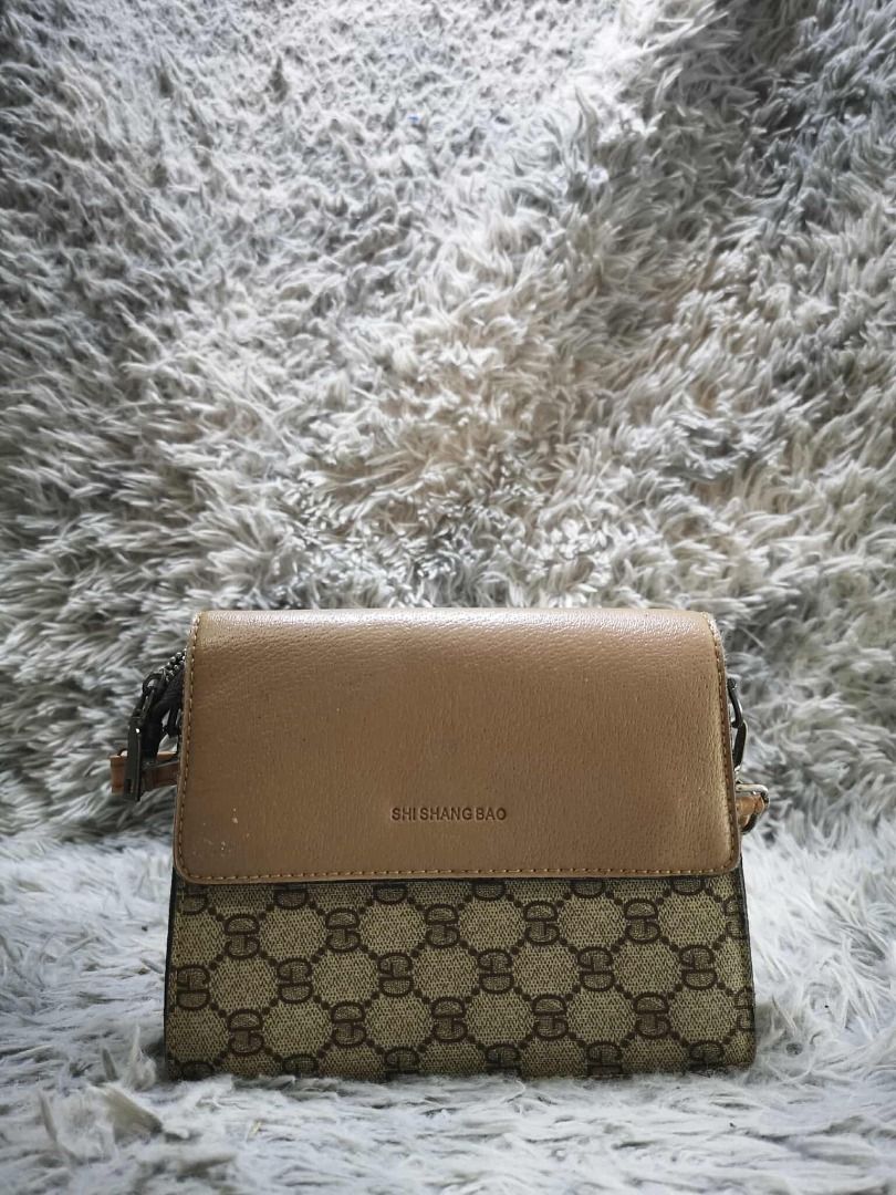 Beige Brown Monogram Flap Crossbody Shoulder Bag (Category: Cross-body Bags) located in Santa Cruz. Submitted by jmy_surplus.2 (Listing ID 1471009985, Image 1). Description: Color: Beige / Tan Brown / Dark Brown Type/Kind: Crossbody Bag / Shoulder Bag / Flap Handbag / Sling Bag Material: - Outer: Monogram Canvas / Fabric - Flap: Textured Faux Leather / PU Leather (estimated) - Strap: Faux Leather - Hardware: Gold-Tone Metal Style: - Vintage - Cla