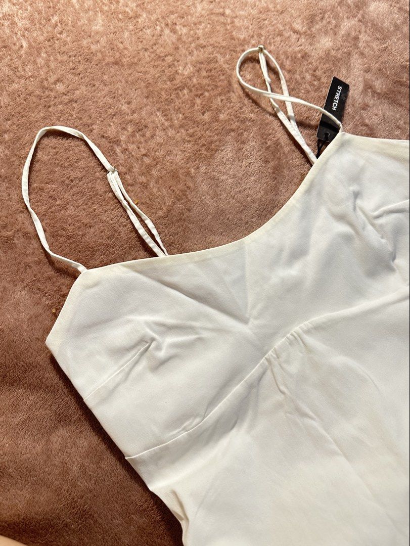 BERSHKA BACK SLIT WHITE DRESS (Category: Dresses) located in Cavite. Submitted by prelovedbyreluv (Listing ID 1471040860, Image 2). Description: never used w/ tag .