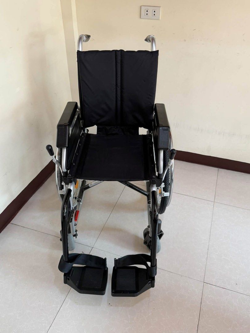 Bischoff & Bischoff Pyro Start Plus Wheelchair (Category: Wheelchairs) located in Manila. Submitted by calmdolphin.87b0e4 (Listing ID 1470954317, Image 2). Description: - Model: Bischoff & Bischoff Pyro Start Plus - Color: Black and silver - Frame: Lightweight metal, fully foldable for easy transport and storage - Seating: Comfortable padded backrest and seat with clean fabric upholstery (minimal signs of wear) - Mobility & Safety: Sturdy wheels 