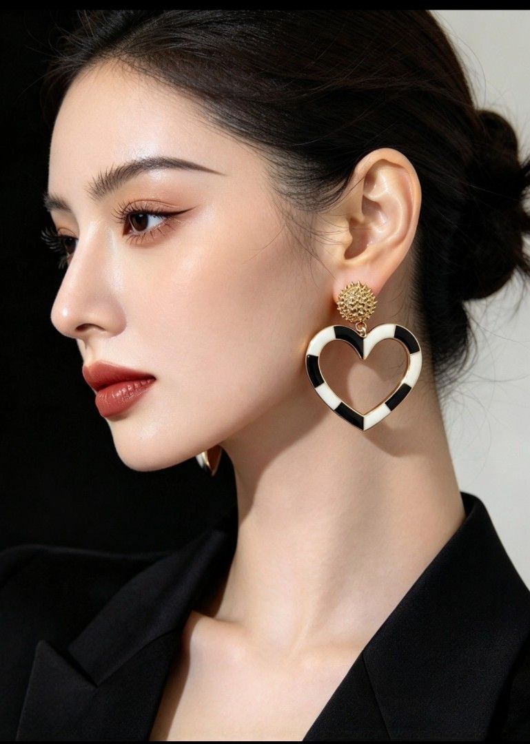 Black and white heart earrings (Category: Earrings) located in Makati City. Submitted by khrizaccessories (Listing ID 1471030965, Image 1). Description: good quality earrings from USA SALE.