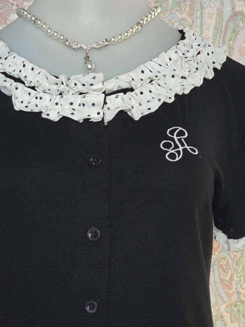 Black and White Polka Dot Ruffle Collar Top (Category: Blouses) located in Dagupan City. Submitted by chislocker14 (Listing ID 1470943296, Image 2). Description: - Color/Design: Black short-sleeve top with front buttons and a white collar/cuffs.