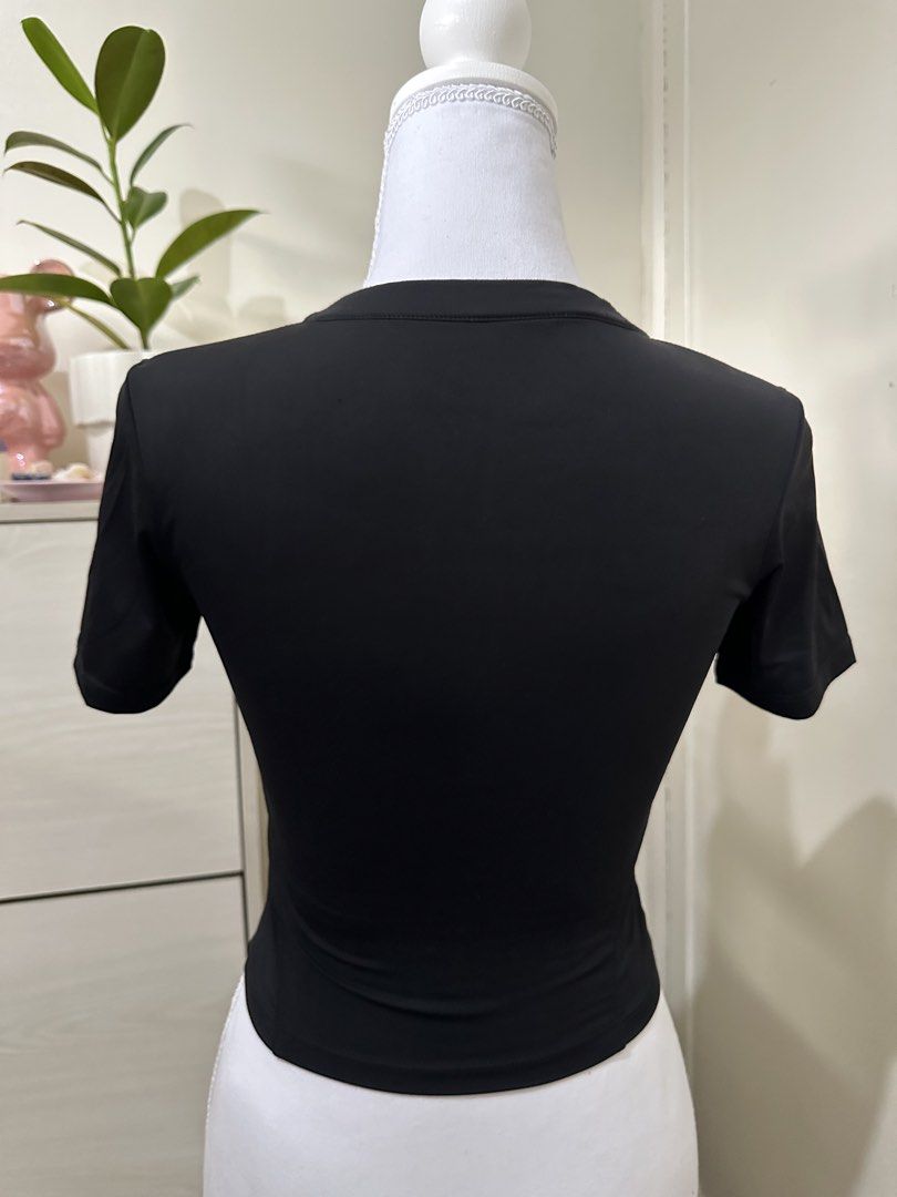 Black half-zip crop top short sleeve shirt (Category: Shirts) located in Antipolo. Submitted by wxyz9876 (Listing ID 1470963085, Image 2). Description: .
