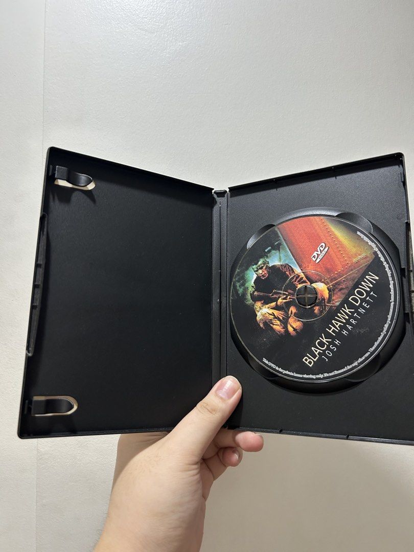 Black Hawk Down (Widescreen Collector's Edition DVD with DTS) (Category: CDs & DVDs) located in San Juan City. Submitted by kera.g815 (Listing ID 1470937529, Image 2). Description: Own a defining piece of modern war cinema with this Widescreen Collector’s Edition DVD of Ridley Scott’s acclaimed film, Black Hawk Down. This specific release features a premium DTS (Digital Theater Systems) audio track, designed to deliver a more immersive, theater-q