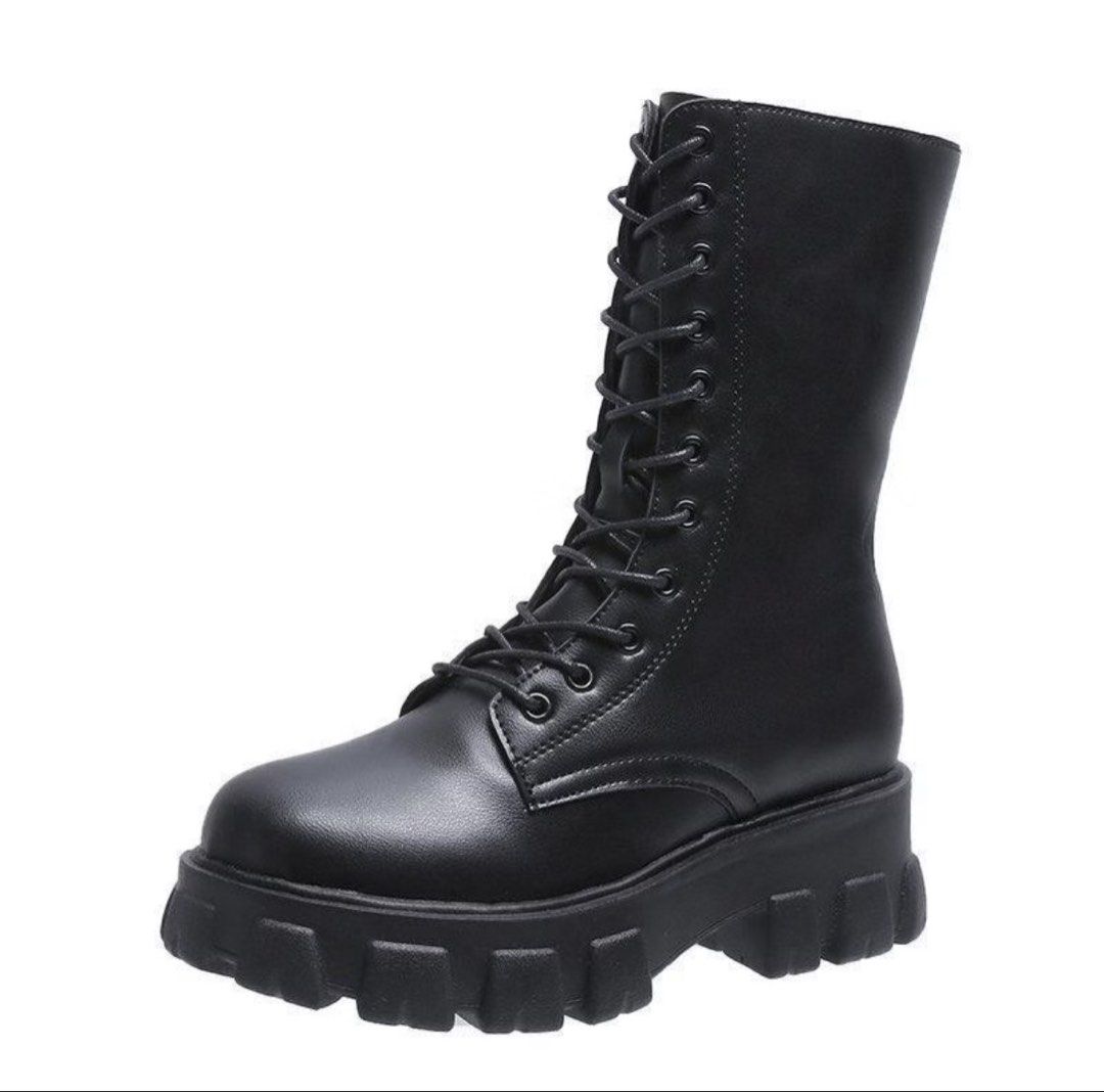 Black Mid-Calf Platform Combat Boots (Category: Boots) located in Manila. Submitted by lilliesnpuppies (Listing ID 1470936450, Image 1). Description: - Style: Mid-calf lace-up combat boots - Sole: Chunky platform lug sole for extra height and traction - Design: Round toe with metal eyelets and smooth matte finish - Versatility: Easy to style with skirts, jeans, or dresses - Only used ONCE.