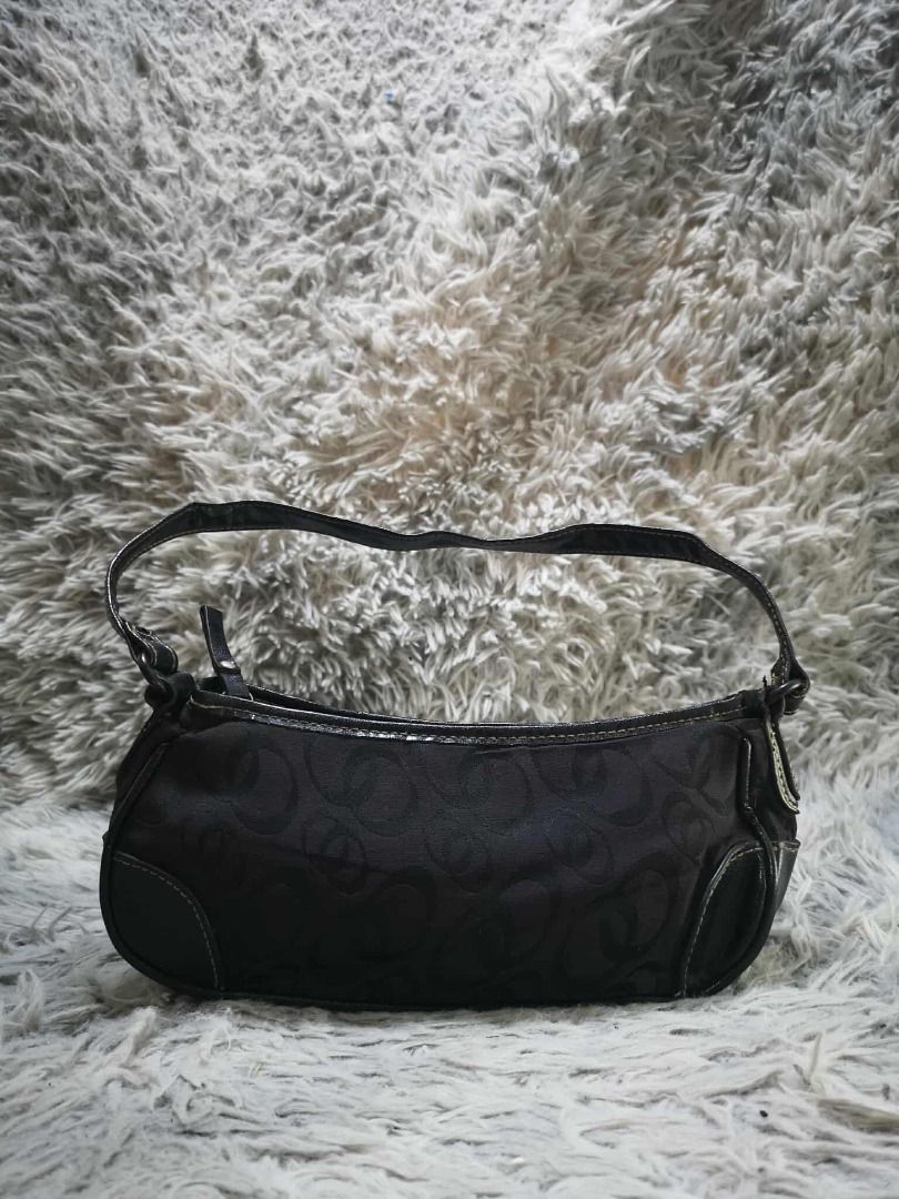 Black Monogram Canvas Y2K Mini Shoulder Handbag (Category: Shoulder Bags) located in Santa Cruz. Submitted by jmy_surplus.2 (Listing ID 1471008144, Image 1). Description: Color: Black / Dark Charcoal Type/Kind: Shoulder Bag / Mini Handbag / Baguette Bag / Underarm Bag Material: - Outer: Monogram Jacquard Canvas / Woven Fabric (estimated) - Trim: Black Faux Leather / PU Leather (estimated) - Strap: Faux Leather - Hardware: Silver-Tone Metal - Clos