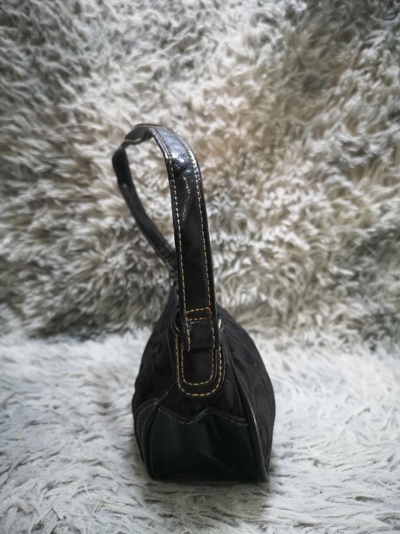 Black Monogram Canvas Y2K Mini Shoulder Handbag (Category: Shoulder Bags) located in Santa Cruz. Submitted by jmy_surplus.2 (Listing ID 1471008144, Image 3). Description: Color: Black / Dark Charcoal Type/Kind: Shoulder Bag / Mini Handbag / Baguette Bag / Underarm Bag Material: - Outer: Monogram Jacquard Canvas / Woven Fabric (estimated) - Trim: Black Faux Leather / PU Leather (estimated) - Strap: Faux Leather - Hardware: Silver-Tone Metal - Clos
