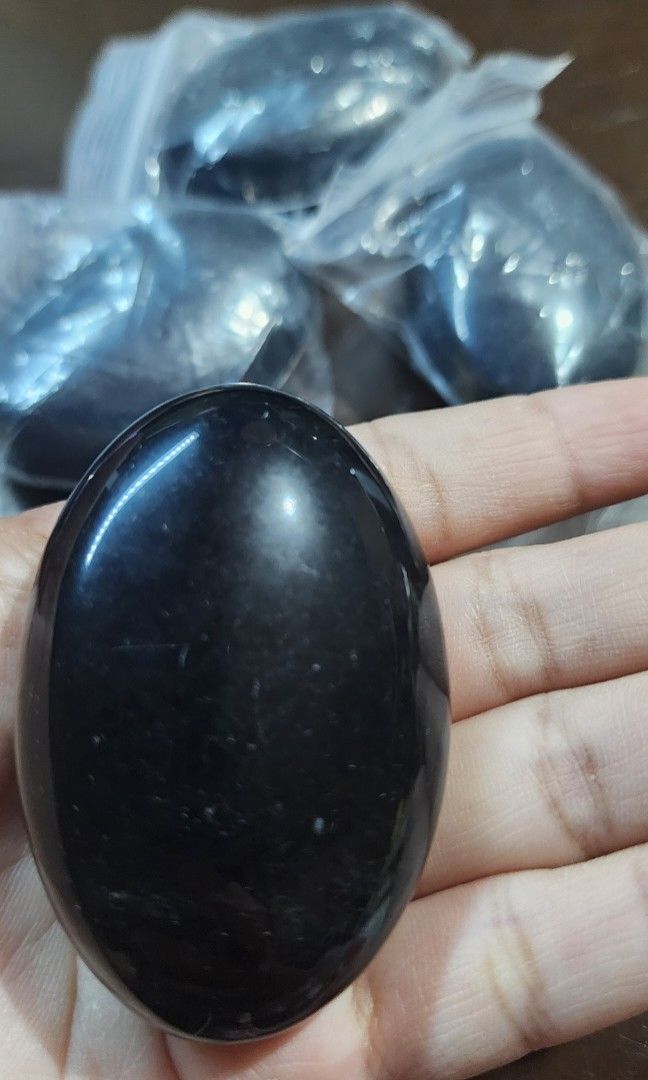 Black obsidian palm stone (Category: Precious Stones) located in Baguio. Submitted by coffeesilvershadow_28 (Listing ID 1471110025, Image 3). Description: From HK box Bnew Black obsidian palm stone.