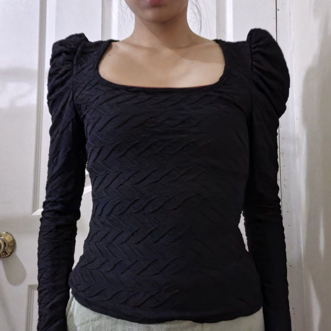 Black Puffed Long Sleeve (Category: Longsleeves) located in Marikina City. Submitted by preloved.mana (Listing ID 1471088347, Image 1). Description: - Color: Black - Square neck - Textured chevron fabric with puffed shoulders - MOP: gcash, maya - MOD: jnt, lalamove - LOC: marikina.