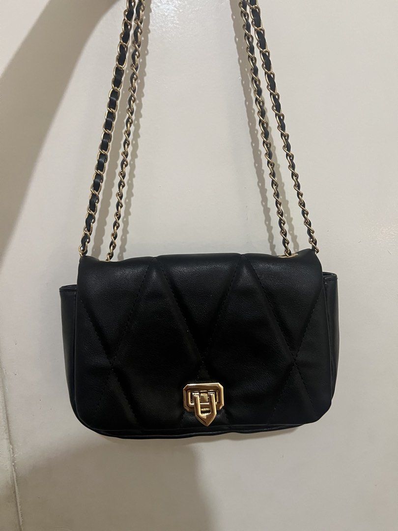 Black Shoulder Bag with Gold Chain Strap (Category: Shoulder Bags) located in Pasig City. Submitted by kirstenswardrobe (Listing ID 1471087794, Image 1). Description: ♡ Trusted and honest seller! ♡ 100% legit items ♡ Will send actual photos upon request ♡ No hidden flaws; condition will be disclosed honestly ♡ Please buy responsibly. Thank you! .