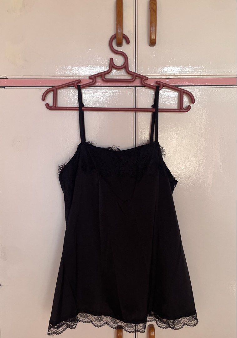 Black Silk Camisole with Lace Trim (Category: Sleeveless) located in Marikina City. Submitted by saaaanby (Listing ID 1471006542, Image 3). Description: Black silk-like camisole top Small to medium body frame WORN ONCE PHP 200 NO LAST PRICE.