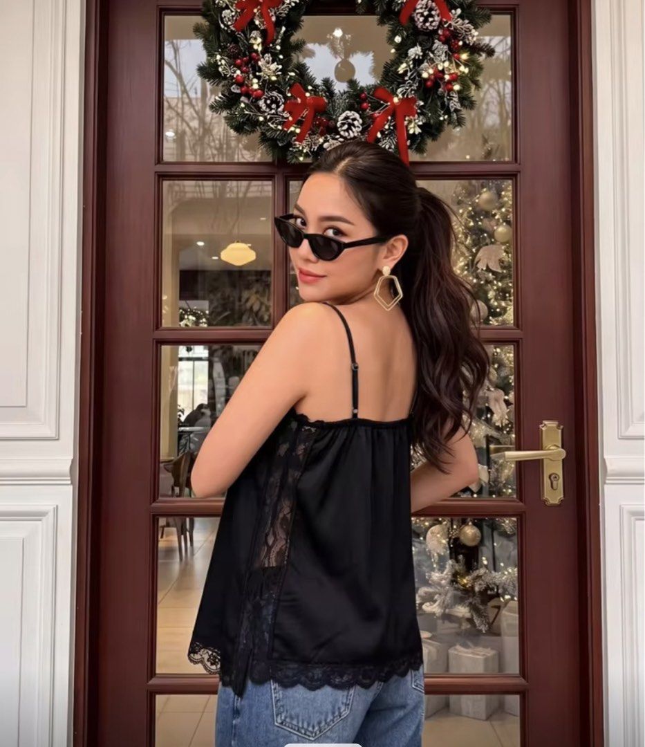 Black Silk Camisole with Lace Trim (Category: Sleeveless) located in Marikina City. Submitted by saaaanby (Listing ID 1471006542, Image 2). Description: Black silk-like camisole top Small to medium body frame WORN ONCE PHP 200 NO LAST PRICE.