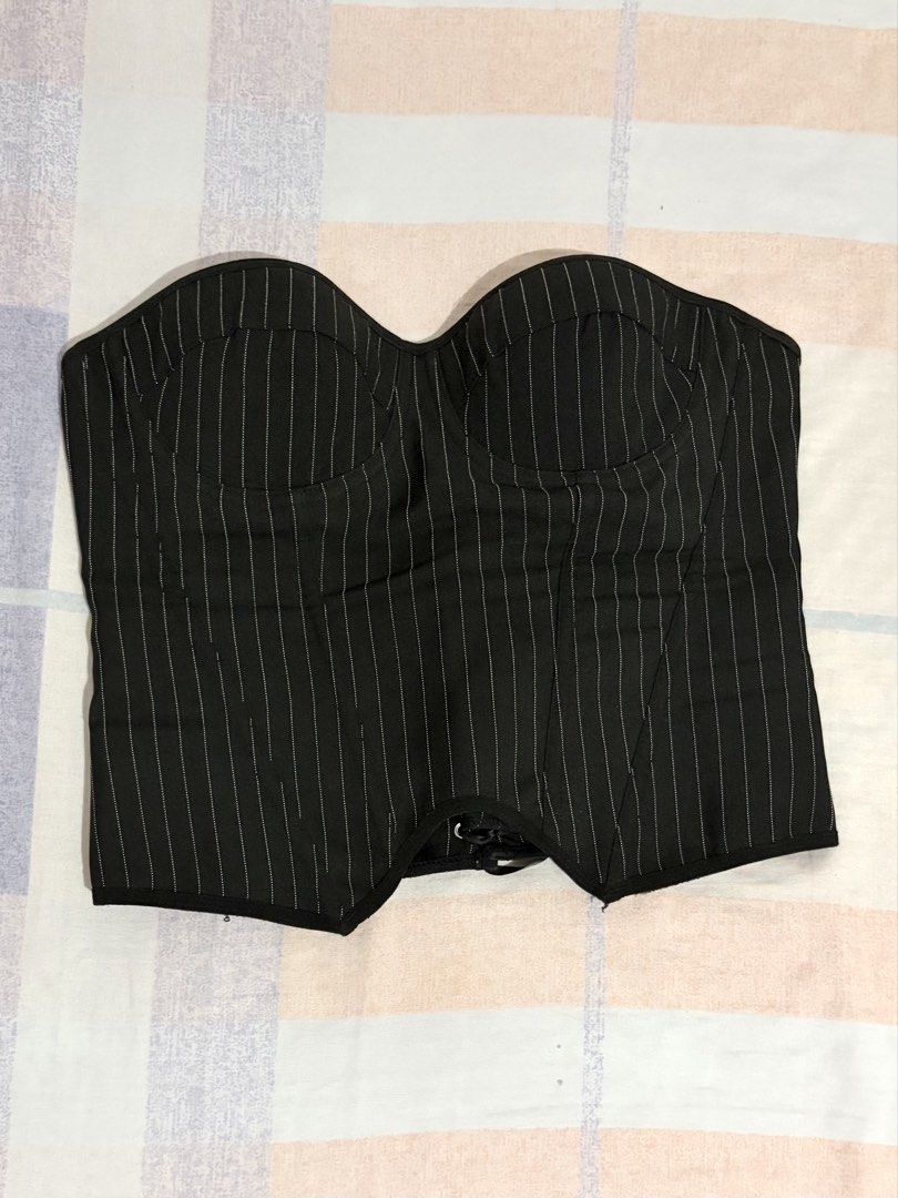 Black Strapless Corset Top with Stripes (Category: Sleeveless) located in Las Pinas. Submitted by hanrue12 (Listing ID 1470972262, Image 2). Description: Original price: ₱540 - Style: Black corset top with white pinstripes and structured cups - Design: Strapless with a curved hem and side zipper, lace-up back detail - Condition: Worn once, excellent shape - Perfect for: Night outs or styling with a blazer - Fit: Super flattering.
