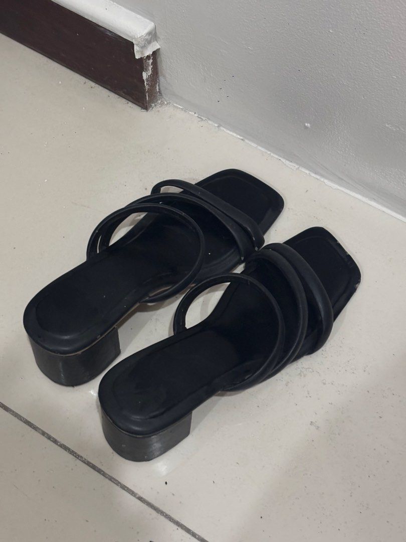 Black Strappy Block Heel Sandals (Category: Heels) located in Manila. Submitted by _pilosofia (Listing ID 1470932476, Image 1). Description: - Color: Black - Style: Strappy slip-on block heels with square toe - Heel: Comfortable chunky block heel for easy walking - Versatility: Perfect for casual outings or office wear.