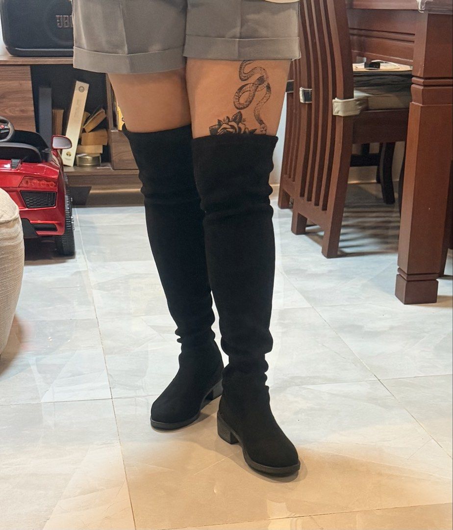 Black Suede Over-The-Knee Boots with Block Heel (Category: Boots) located in Tagum. Submitted by hachiiing (Listing ID 1468586064, Image 2). Description: - Color: Black - Material: Soft faux suede - Heel: Low block heel for all-day comfort - Toe: Round toe shape - Fit: Adjustable drawstring tie at the top back - Style: Pull-on design - Versatility: Perfect to pair with shorts, skirts, or skinny jeans BAGAY SA LAHAT NG AUTUMN O WINTER OUTFIT SIZE 