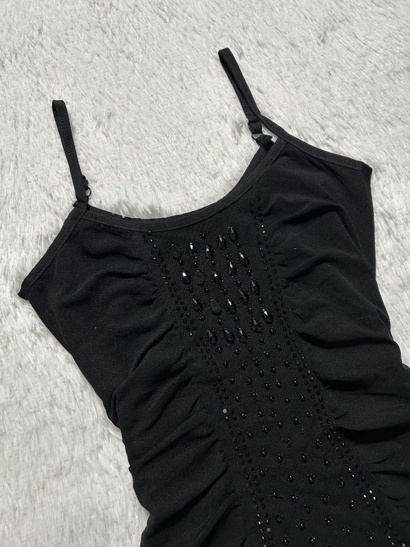 Black Y2K-style Ruched Camisole (Category: Sleeveless) located in Quezon City. Submitted by herarchiveph (Listing ID 1470996313, Image 3). Description: Bust: 28 Inches Length: 23.5 Inches Minor Issue: Missing Few beads (barely noticeable).
