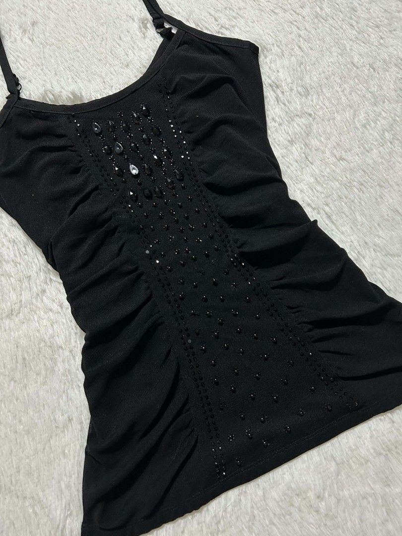 Black Y2K-style Ruched Camisole (Category: Sleeveless) located in Quezon City. Submitted by herarchiveph (Listing ID 1470996313, Image 2). Description: Bust: 28 Inches Length: 23.5 Inches Minor Issue: Missing Few beads (barely noticeable).