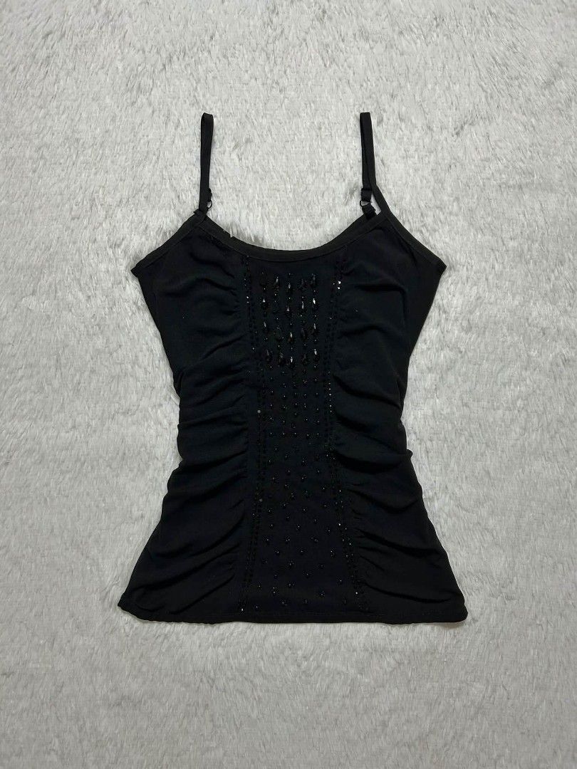 Black Y2K-style Ruched Camisole (Category: Sleeveless) located in Quezon City. Submitted by herarchiveph (Listing ID 1470996313, Image 1). Description: Bust: 28 Inches Length: 23.5 Inches Minor Issue: Missing Few beads (barely noticeable).