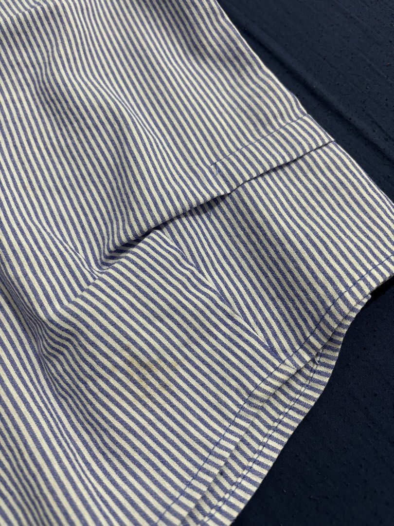 Blue and white striped button-front blouse size L (Category: Blouses) located in Dasmarinas. Submitted by aurea_lovely (Listing ID 1470992338, Image 3). Description: XS-M Issue: may stain.