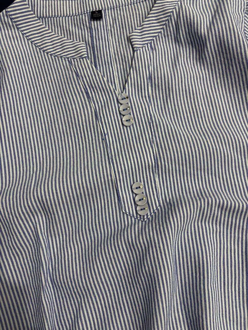 Blue and white striped button-front blouse size L (Category: Blouses) located in Dasmarinas. Submitted by aurea_lovely (Listing ID 1470992338, Image 2). Description: XS-M Issue: may stain.