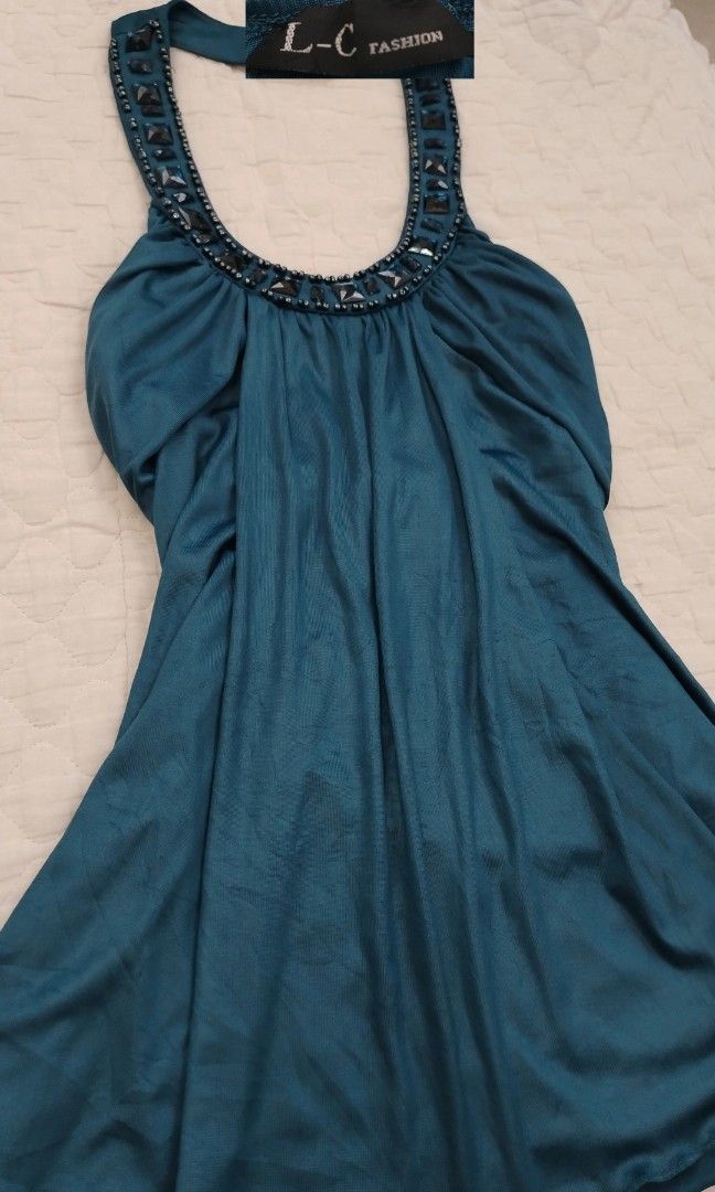Blue beaded halter top (Category: Sleeveless) located in Panabo. Submitted by _elfiethreads (Listing ID 1471058026, Image 2). Description: Medium Garterized No issues.