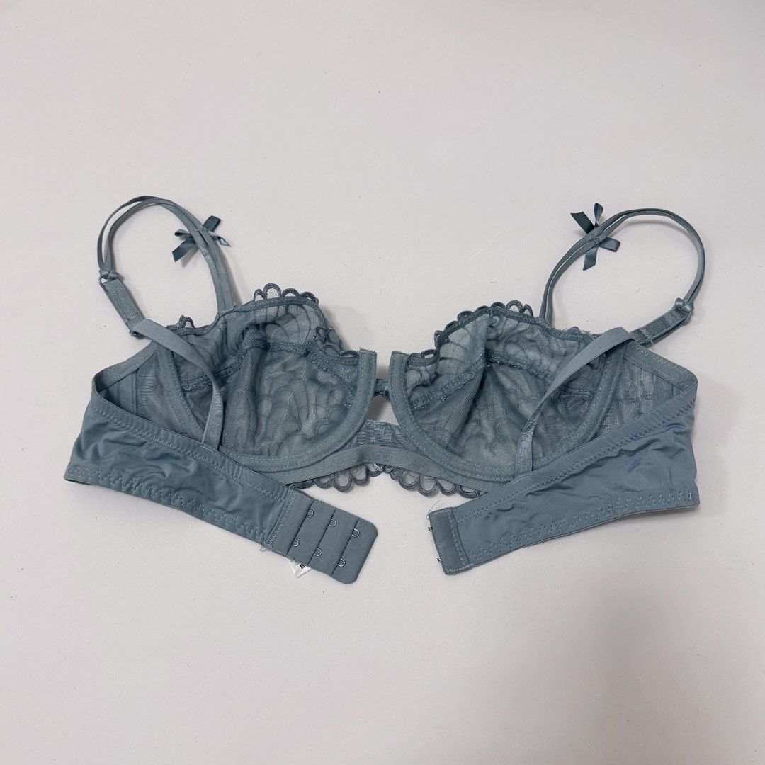 Blue Gray Floral Lace Unlined Bra [36B] (Category: Undergarments & Loungewear) located in Malabon City. Submitted by k_intimates (Listing ID 1471102439, Image 3). Description: Details: • Size 36B / wired / unlined • No issues • Blue gray floral lace unlined underwire bra with scalloped edges and small bow details on the straps and center gore..