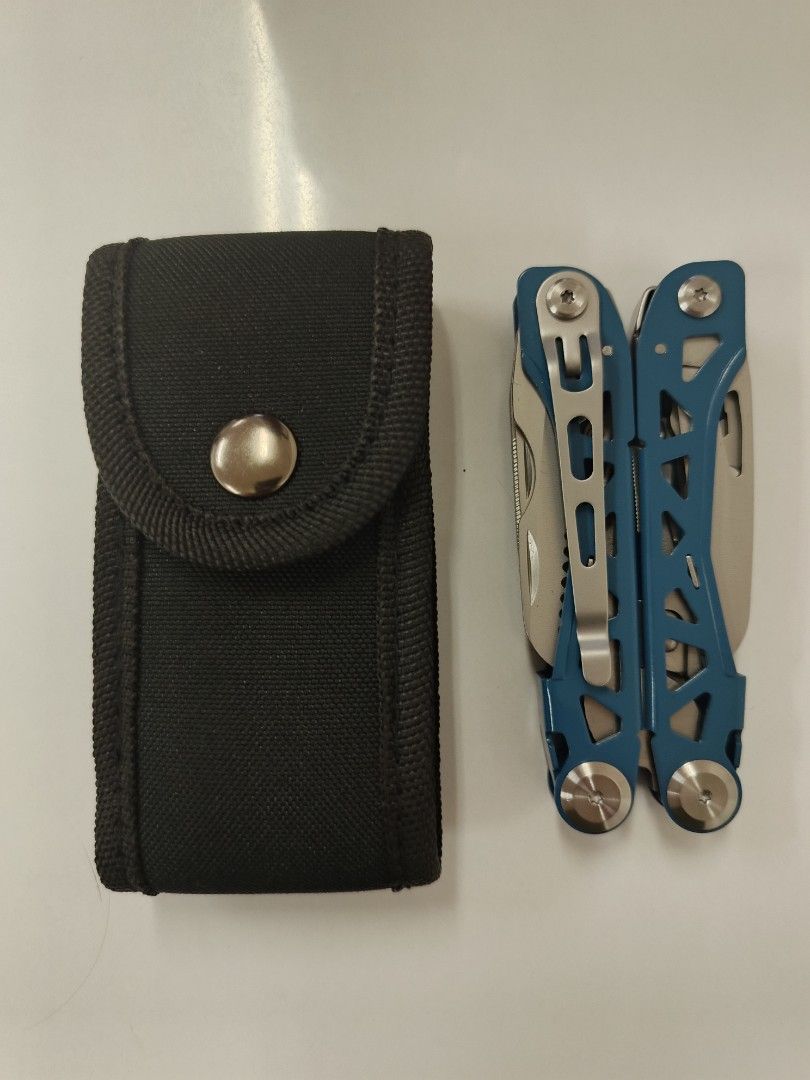Blue Multi-Tool Pliers With Black Pouch (Category: Construction Tools & Equipment) located in Bacolod City. Submitted by viclawrence (Listing ID 1470999229, Image 3). Description: - Color: Blue with black fabric pouch - Material: Sturdy, heavy-duty stainless steel tools - Included tools: Pliers, knife, saw, bottle opener, files, screwdrivers, and hex wrench - Compact design: Folds up easily to fit in your pocket or the included sheath - Perfect f