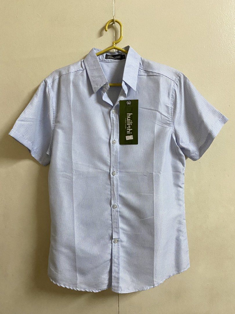 Blue Patterned Short Sleeve Button Shirt (Category: Tshirts & Polo Shirts ) located in Makati City. Submitted by pepperstoremerch (Listing ID 1471091594, Image 1). Description: Brand new W/ Tag Huilishi Blue Button Shirt Size Medium Cotton Brand new Please see pictures D0126 P261030R.