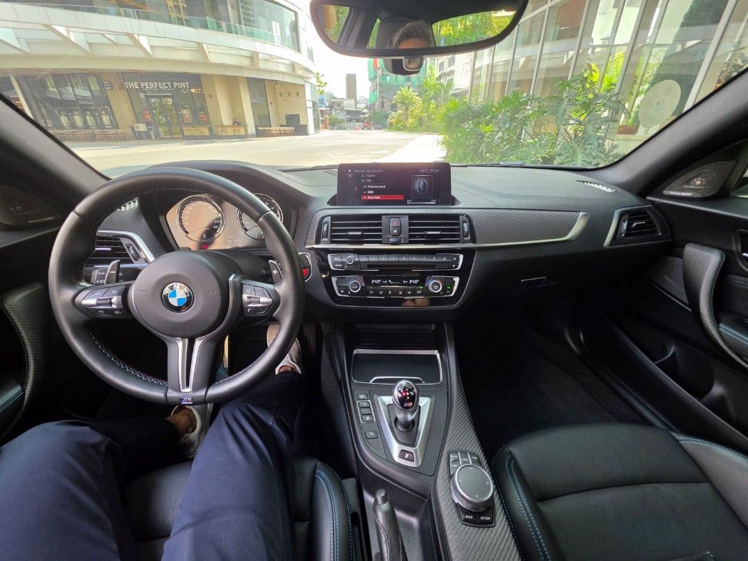 BMW M2 Competition Package (A) (Category: Used Cars) located in Pasig City. Submitted by nicoleenrico03 (Listing ID 1470998711, Image 3). Description: BMW M2 Competition 2019 14k km only Casa Maintained Flawless Interior Alpine White Exterior M Sport Seats Original M2 CS Frozen Gold Rims Complete papers & keys 3,800,000 Viewing in Rockwell.