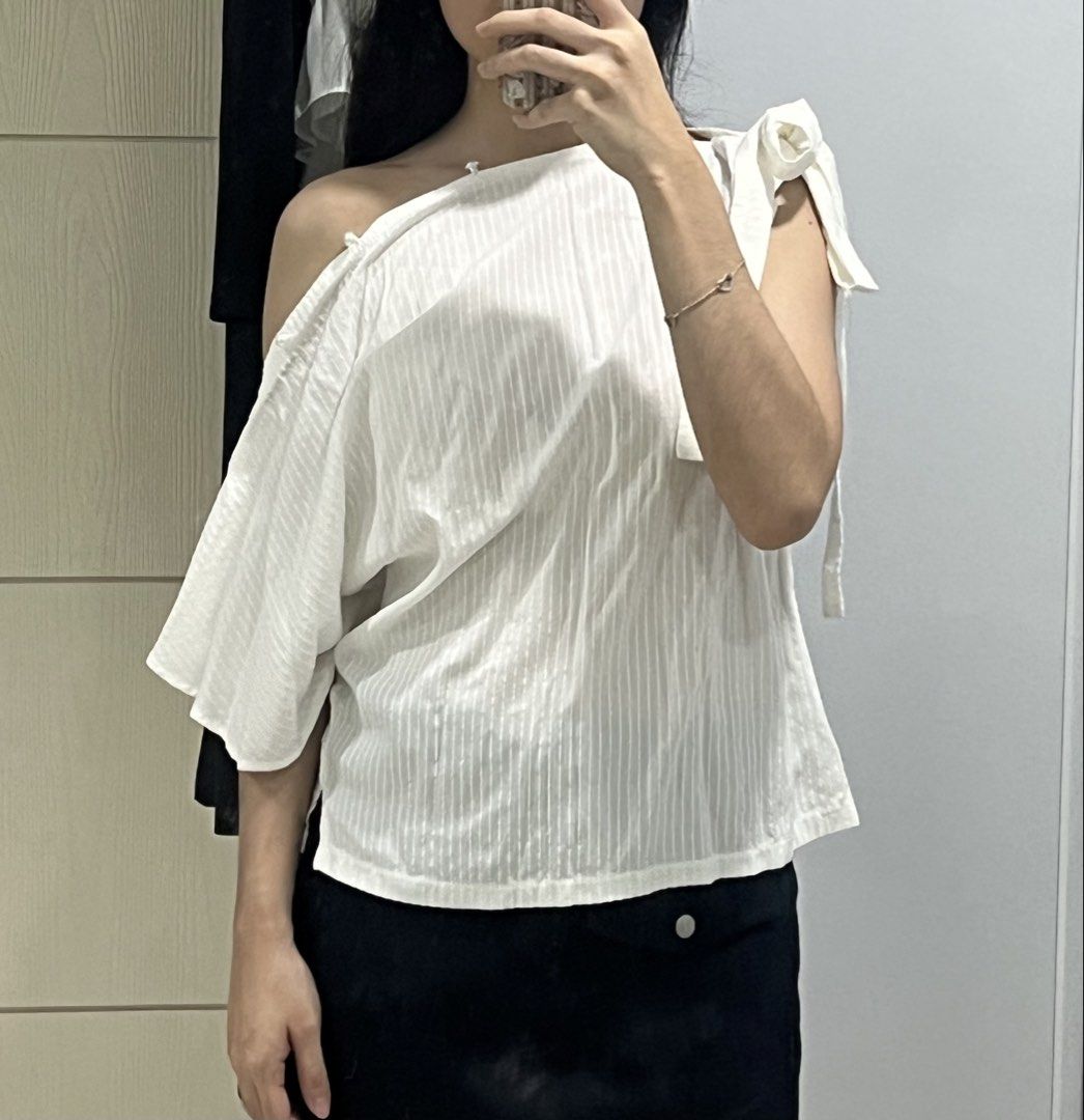 BNWT Indonesian Brand Multiway Blouse Top (Category: Blouses) located in Manila. Submitted by riri.to.you (Listing ID 1471048663, Image 1). Description: - brand new with tags - got this for approx. 900+ - buttons are all functioning, ribbon can be untied too - so many ways to wear! - fits xs to semi medium.