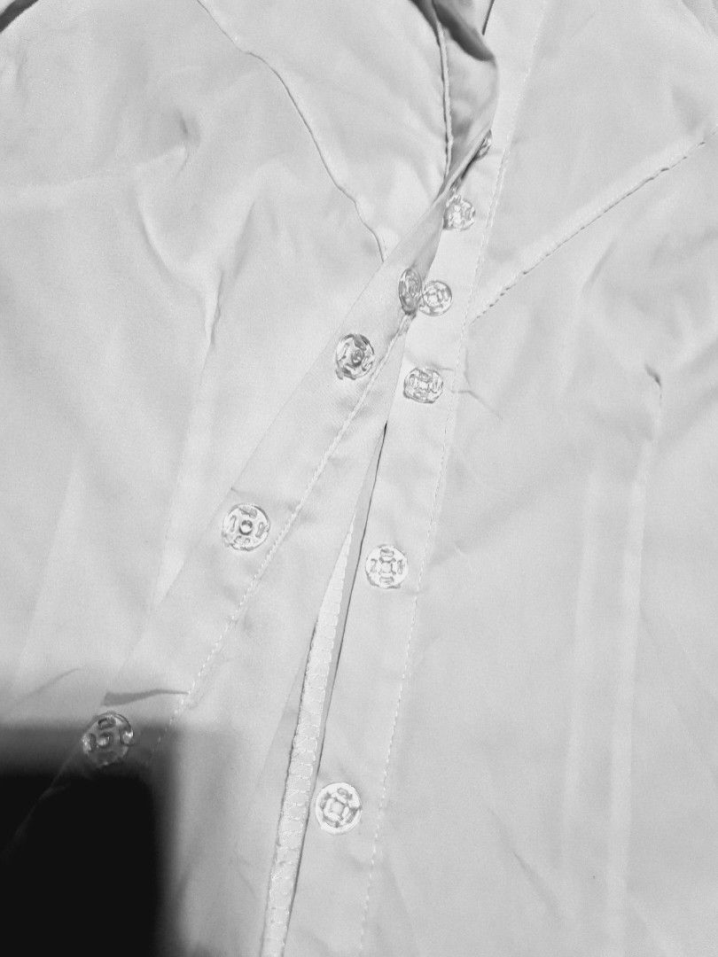 Body hugging white longsleeves stretchable (Category: Longsleeves) located in Angeles City. Submitted by milovewardrobe (Listing ID 1470957800, Image 2). Description: S-m Snap button Stretchable fabric.